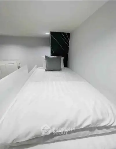 Cozy minimalist bedroom with single bed and modern decor