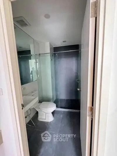 Modern bathroom with glass shower and sleek design