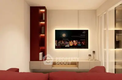 Modern living room with stylish TV setup and elegant shelving, perfect for entertainment and relaxation.
