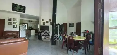Spacious living room with dining area and modern decor