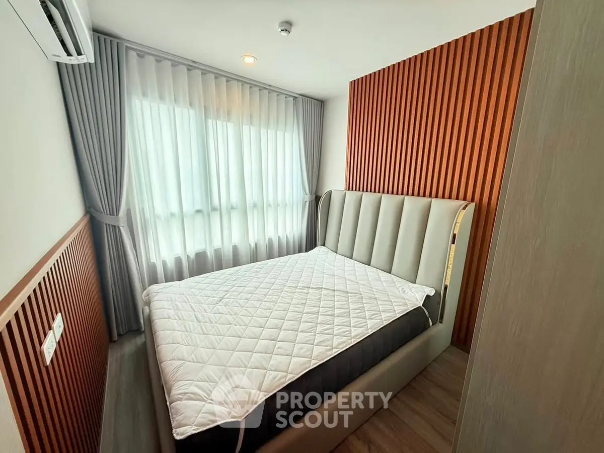 Modern bedroom with stylish design and natural light