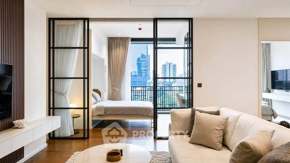 Luxurious modern living room with city view and elegant bedroom separation.