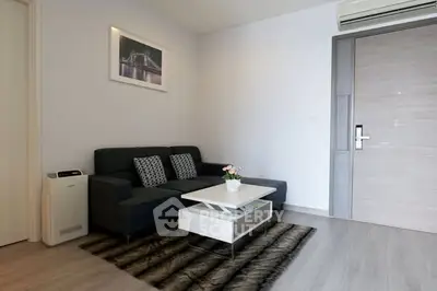 Modern living room with sleek furniture and stylish decor in a contemporary apartment.