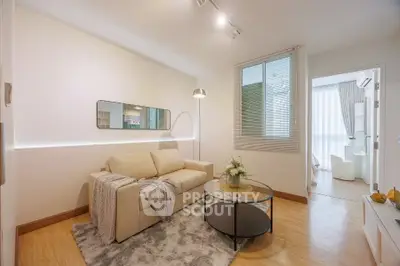 Modern living room with cozy sofa and stylish decor