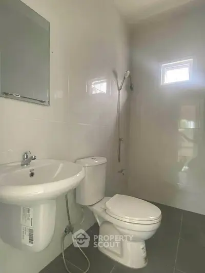 Modern bathroom with sleek fixtures and natural light