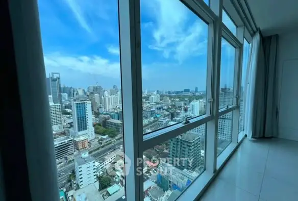 Stunning cityscape view from high-rise apartment window