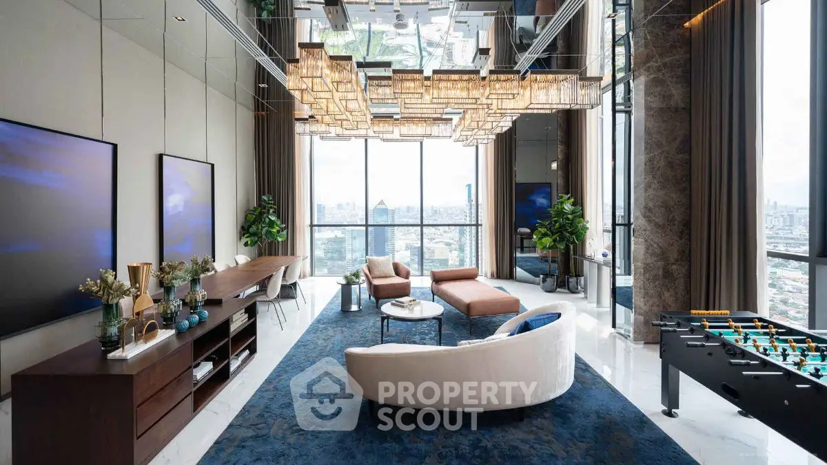 Luxurious modern living room with panoramic city view and elegant decor.
