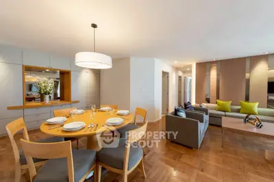Spacious modern living room with elegant dining area and stylish decor