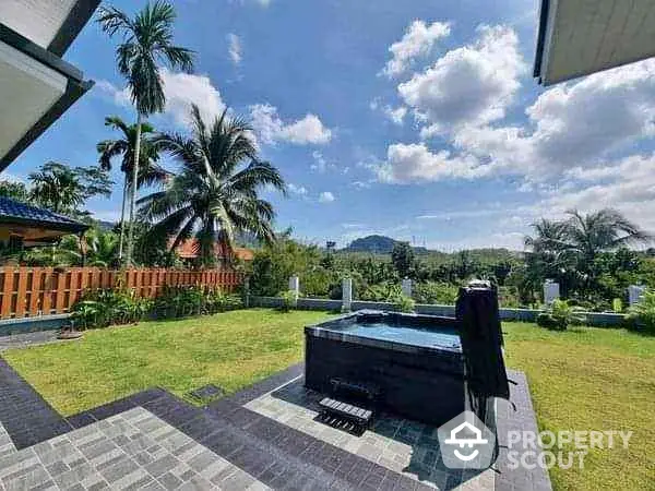 Luxurious garden with hot tub and stunning mountain view