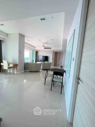 Spacious modern living room with elegant furnishings and natural light