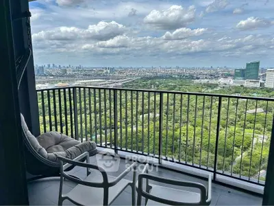Stunning high-rise balcony with panoramic city and park views