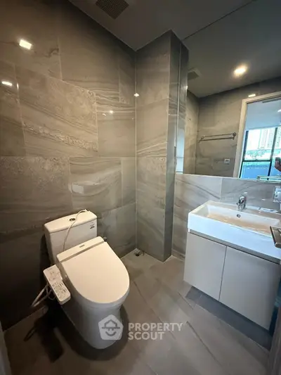 Modern bathroom with sleek fixtures and elegant tile design