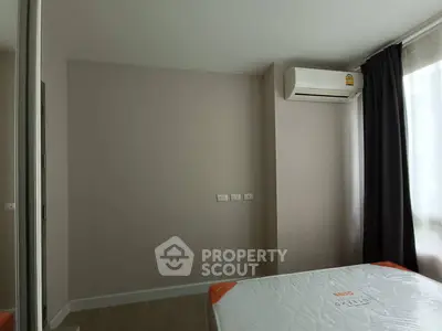 Modern bedroom with air conditioning and natural light