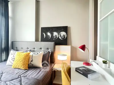 Modern bedroom with stylish decor and cozy workspace