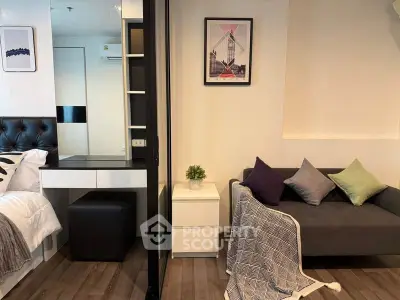 Modern studio apartment with cozy living area and stylish decor