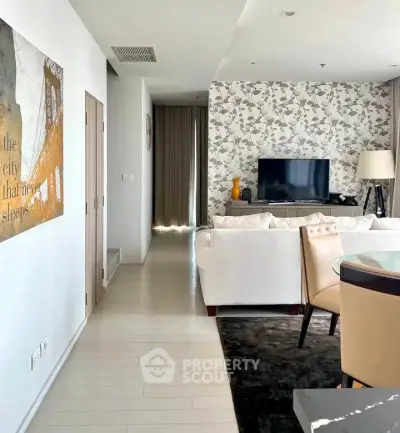 Stylish living room with modern decor and floral accent wall