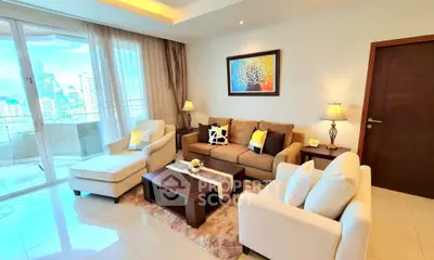 Luxurious living room with modern decor and city view balcony