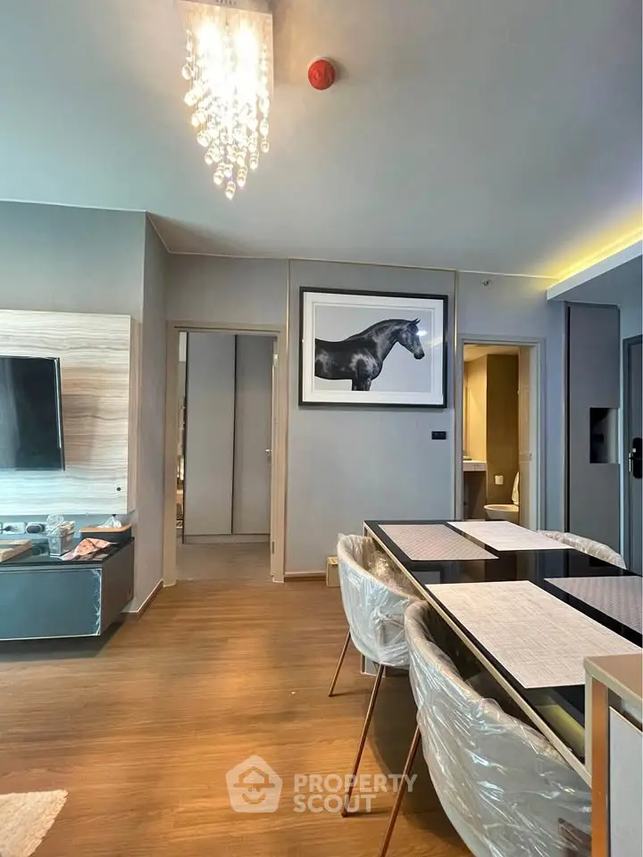 Modern living room with elegant dining area and stylish decor