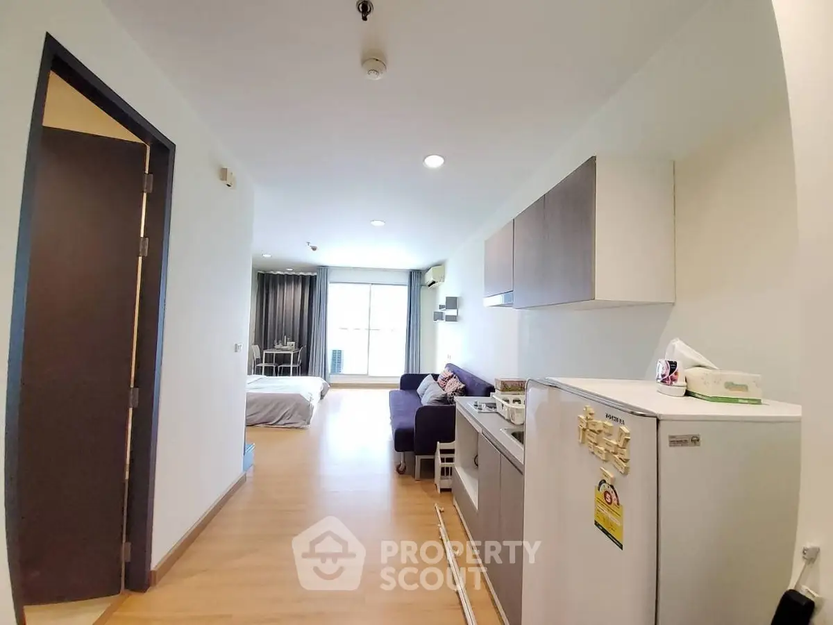 Modern studio apartment with open layout and stylish furnishings