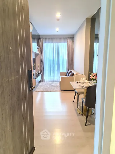 Modern living room with cozy seating and elegant decor, perfect for relaxation and entertainment.