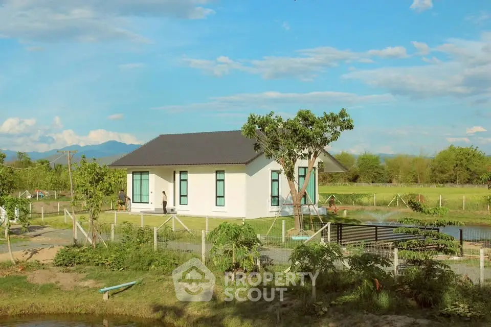 Charming countryside house with lush garden and scenic mountain views