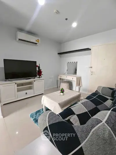 Modern living room with stylish decor and entertainment center