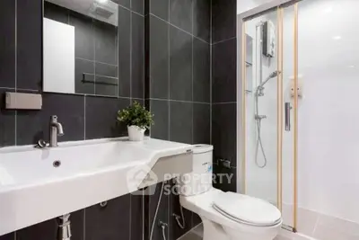 Modern bathroom with sleek design and shower enclosure
