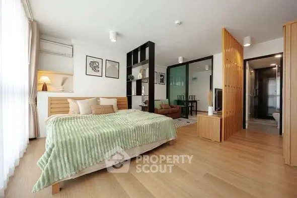 Spacious modern bedroom with open layout and stylish decor