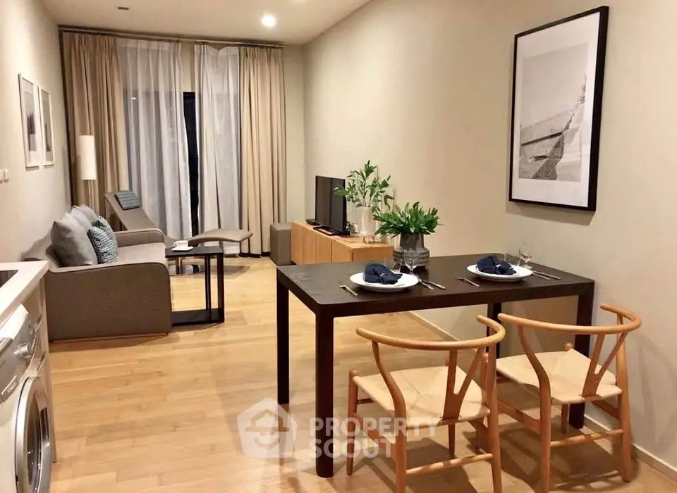 Modern living room with dining area, featuring stylish furniture and elegant decor, perfect for urban living.