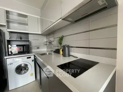 Modern kitchen with sleek appliances and efficient layout