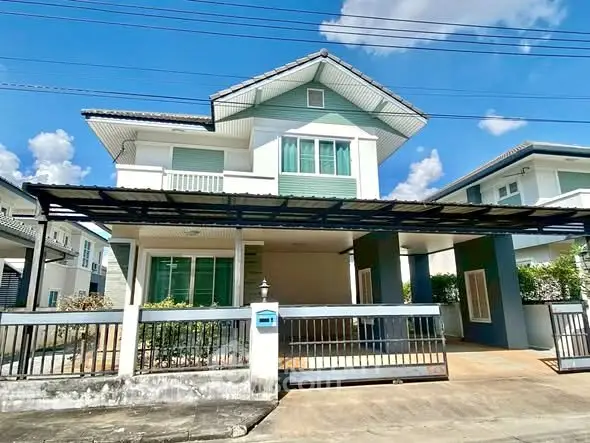 Charming two-story house with modern design and spacious driveway in a serene neighborhood.