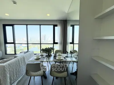 Modern living room with dining area and panoramic city view through large windows.