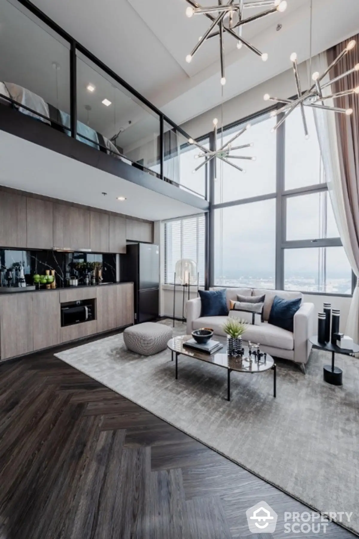 Luxurious modern living room with high ceilings and mezzanine, featuring elegant lighting and panoramic city views.