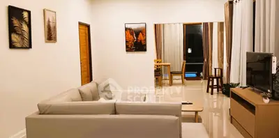 Modern living room with elegant decor and cozy seating area