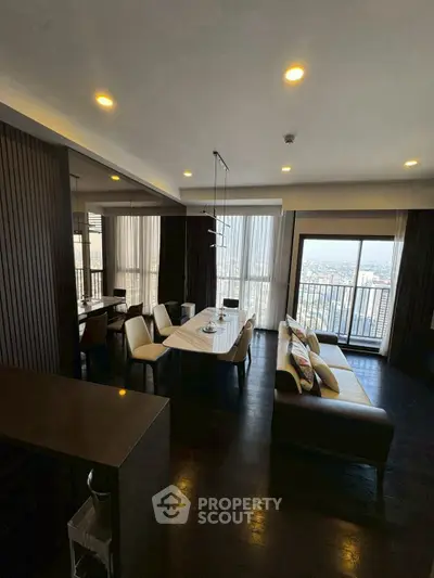 Luxurious living room with stunning city view and elegant dining area