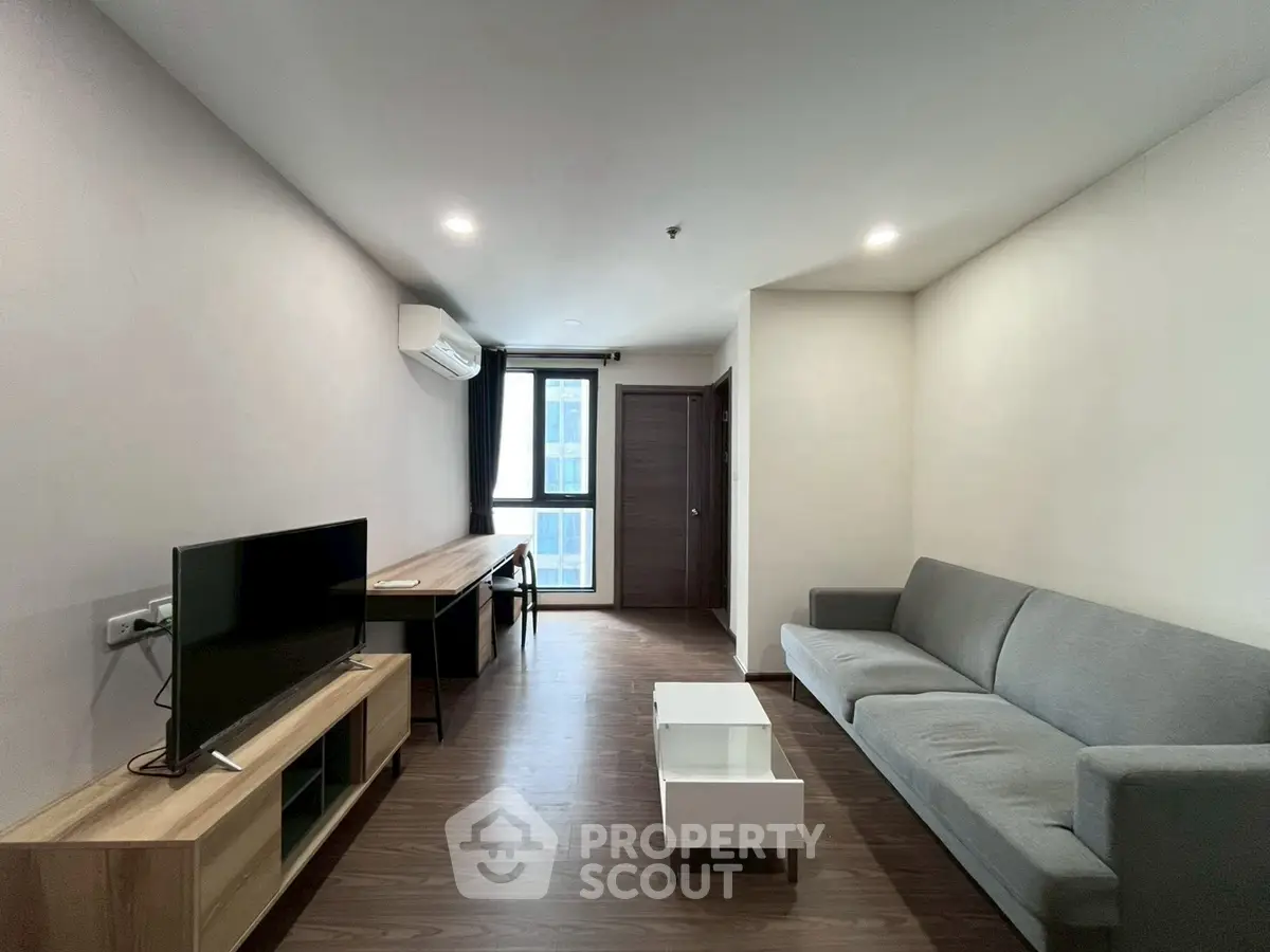 Modern living room with sleek furniture and natural light