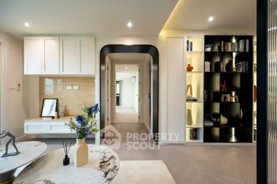 Modern living room with elegant decor and built-in shelving