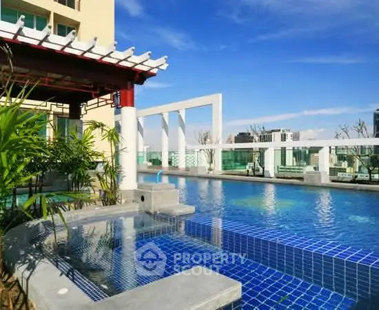 Luxurious rooftop pool with stunning city views and modern design.