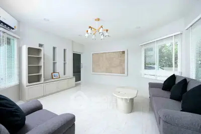 Spacious modern living room with elegant furniture and natural light