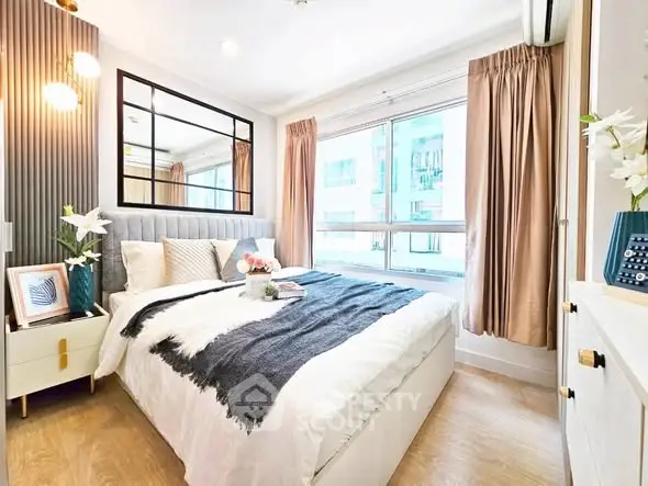 Bright and cozy bedroom with large window and modern decor