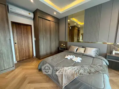 Luxurious modern bedroom with elegant wood accents and ambient lighting