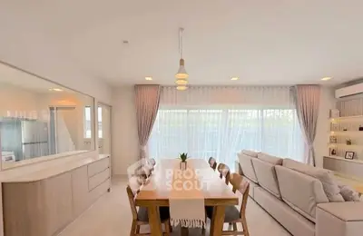 Spacious modern living room with elegant dining area and natural light