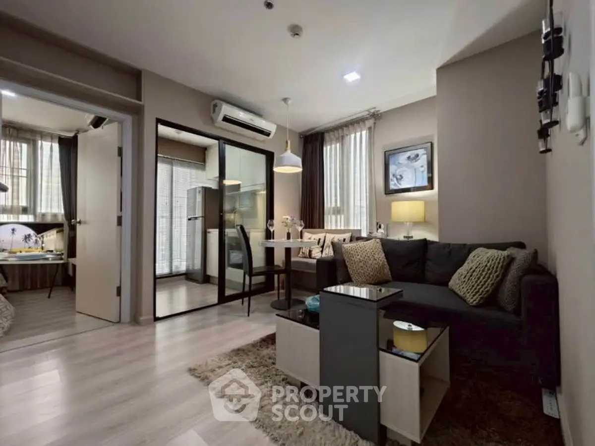 Modern living room with cozy seating and dining area in stylish apartment