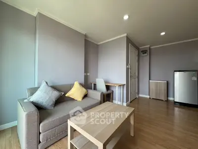 Modern living room with cozy sofa and wooden coffee table in stylish apartment
