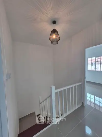 Modern staircase with elegant lighting in a contemporary home interior