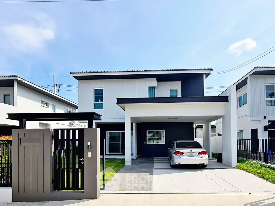 Modern two-story house with carport and sleek design in a suburban neighborhood.