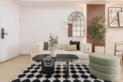 Modern living room with stylish decor, featuring a cozy sofa, chic coffee table, and elegant wall mirror.