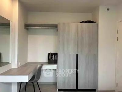 Modern study room with sleek desk and spacious wardrobe in minimalist design.