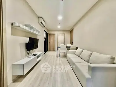 Modern living room with sleek furniture and minimalist design