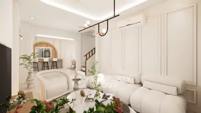 Luxurious modern living room with elegant furniture and open kitchen layout
